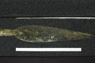 The gold-decorated spearhead. (Image: GUARD Archaeology)